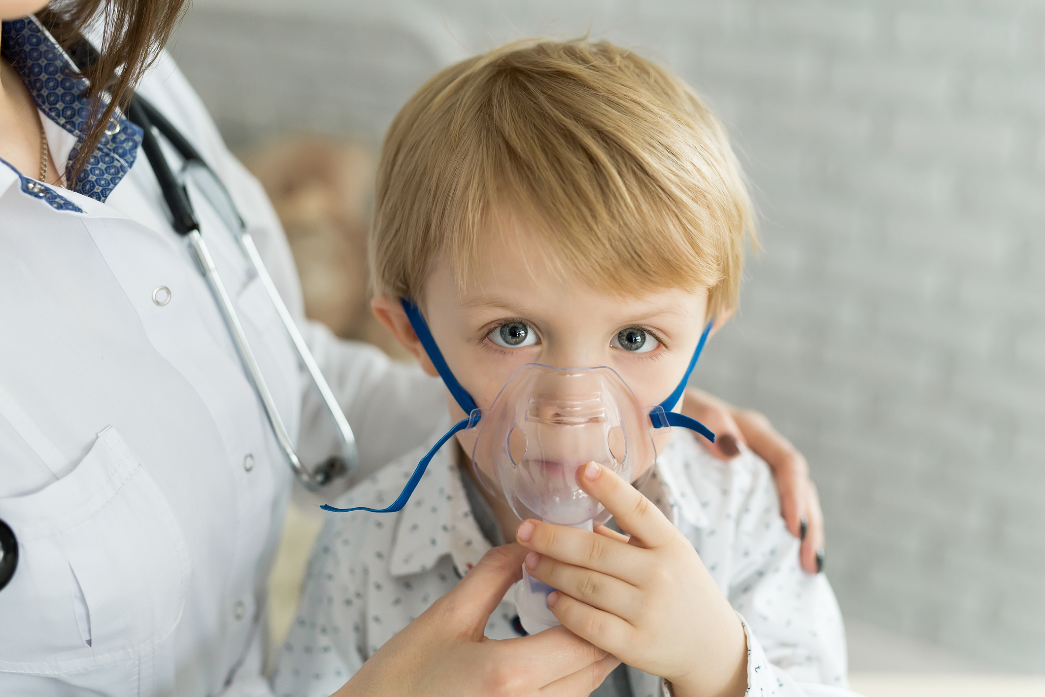 image-medical-doctor-applying-medicine-inhalation-treatment-on-a-little-boy-with-asthma-inhalation-therapy-by-the-mask-of-inhaler