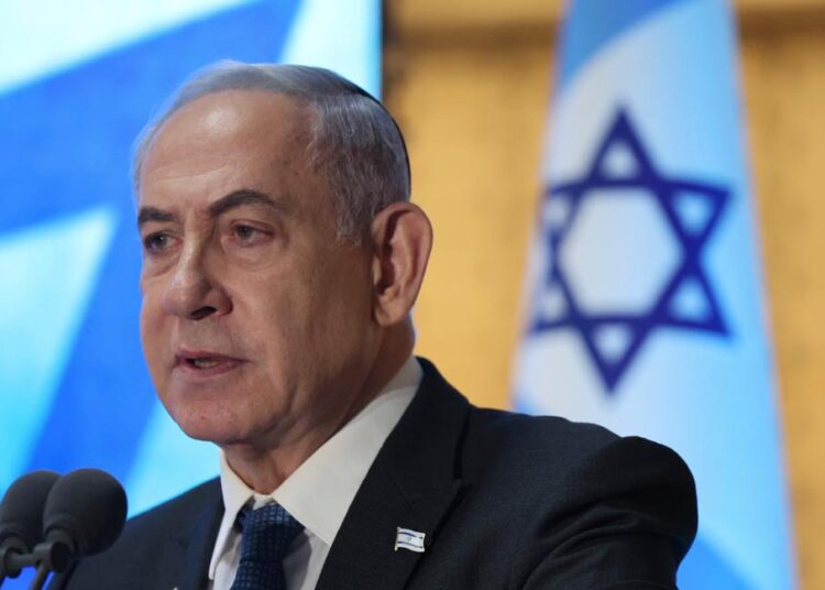 Israeli Prime Minister Benjamin Netanyahu attends a memorial ceremony for Israeli soldiers who fell in battle during the 2014 Gaza War, in the Hall of Remembrance at Mount Herzl Military Cemetery in Jerusalem on Tuesday, July 16, 2024.  (Abir Sultan/Pool Photo via AP)