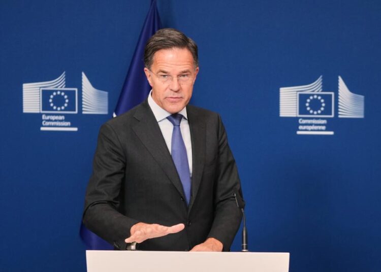 NATO Secretary General Mark Rutte delivers a statement during a media conference at EU headquarters in Brussels, Tuesday, Sept. 30, 2025. (AP Photo/Virginia Mayo)