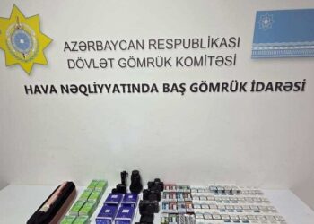 Mobil telefonda gizlədilmiş qızıl külçələr aşkarlandı