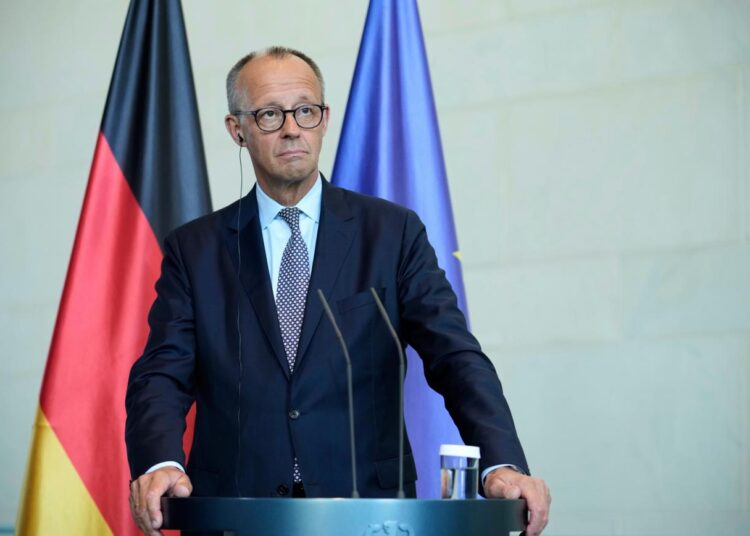 German Chancellor Friedrich Merz attends a joint press statement with Ukrainian President Volodymyr Zelenskyy following talks with European and U.S. leaders in Berlin, Germany, Wednesday, Aug. 13, 2025. (AP Photo/Ebrahim Noroozi)