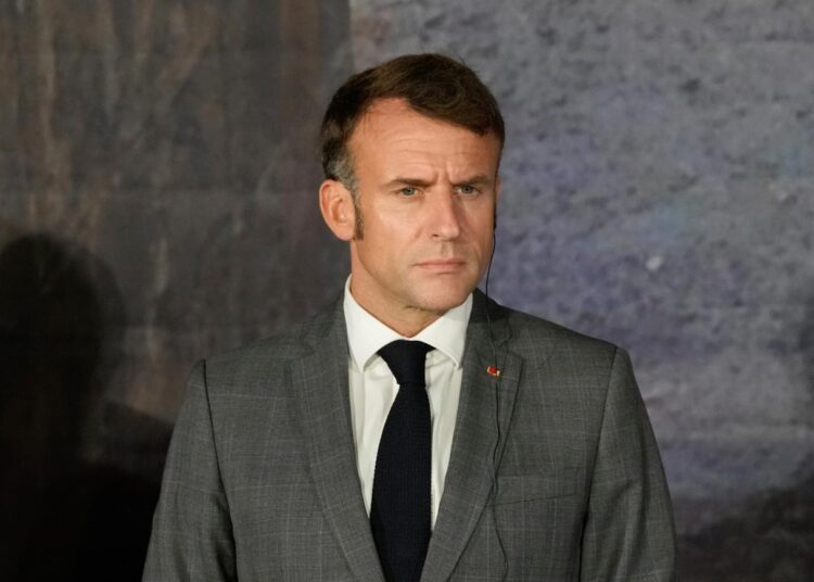 French President Emmanuel Macron, listens during a news press conference in Paphos ,Cyprus, on Friday, Oct 11, 2024 as the leaders of nine southern European Union member countries and Jordan are meeting to come up with ways of de-escalating the conflict in the Middle East (AP Photo/Petros Karadjias)