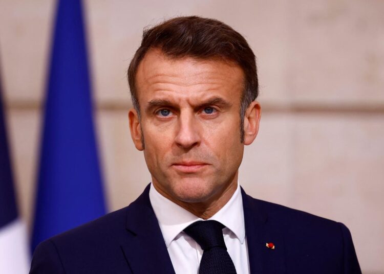 French President Emmanuel Macron delivers a statement as part of Nigerian President Bola Tinubu's two-day state visit to France, Thursday, Nov. 28, 2024 at the Elysee Palace in Paris. (Sarah Meyssonnier/Pool via AP)