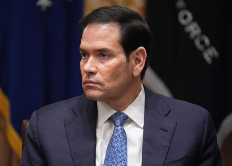 Secretary of State Marco Rubio listens as President Donald Trump meets with Hungary's Prime Minister Viktor Orban in the Cabinet Room of the White House, Friday, Nov. 7, 2025, in Washington. (AP Photo/Evan Vucci)