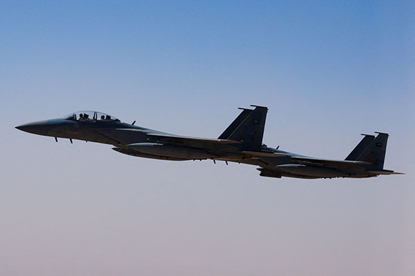 FILE PHOTO: A Saudi fighter jet accompanies Air Force One, carrying U.S. President Donald Trump, on approach to the King Khalid International Airport in Riyadh, Saudi Arabia, May 13, 2025. REUTERS/Brian Snyder/File Photo
