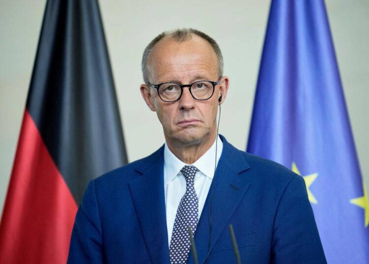 German Chancellor Friedrich Merz attends a joint press conference with Romania's President Nicusor Dan at the chancellory in Berlin, Germany, Friday, July 18, 2025. (AP Photo/Ebrahim Noroozi)